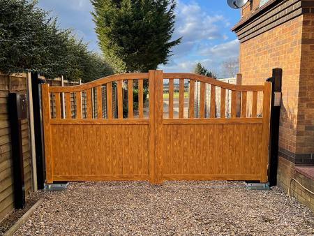 woodgrain effect finished aluminium gates with long guarantees.